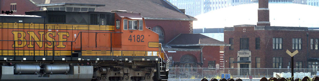 BNSF train with buildings in background